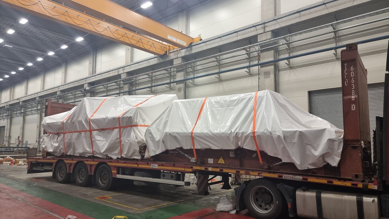 Machine secured on a trailer